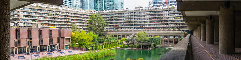 The iconic brutalist architecture of The Barbican housing estate in the City of London, UK.