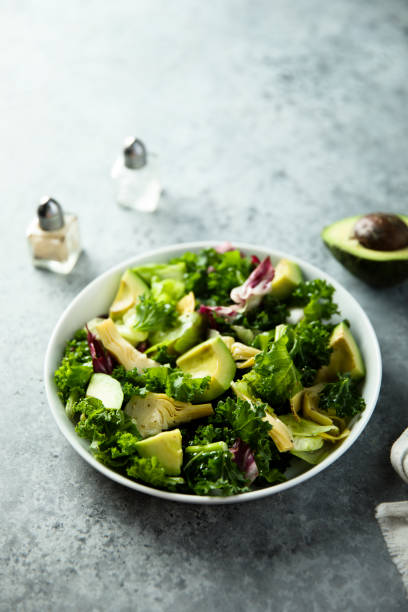 istock Salad with artichoke and avocado 1359112592