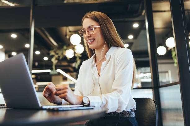 istock Happy young businesswoman taking a video call 1359112698