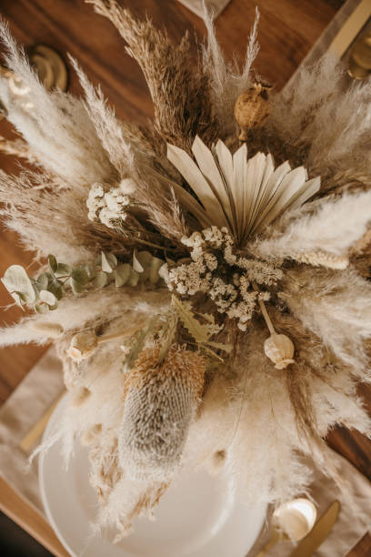 istock Close up view of dried bouquet on table in restaurant 1359113640