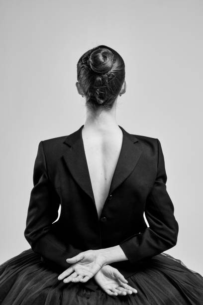 istock Girl in a jacket put on the back 1359116439