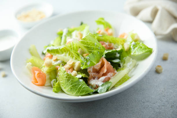 istock Caesar salad with smoked salmon 1359116525