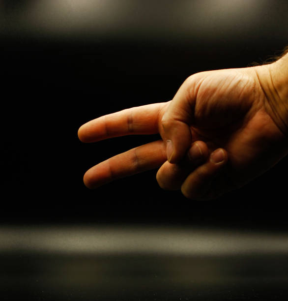 istock Male hand shape on black background 1359122174