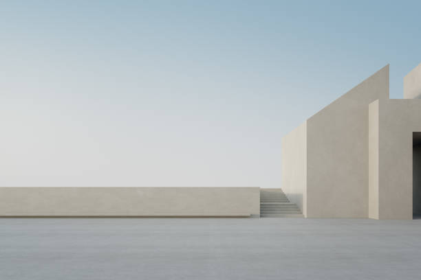 Empty concrete floor and white cement wall in city park.