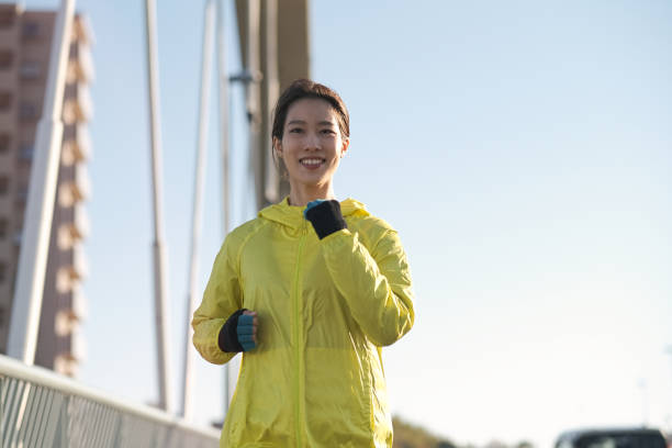 istock Closeup of running woman 1359127399