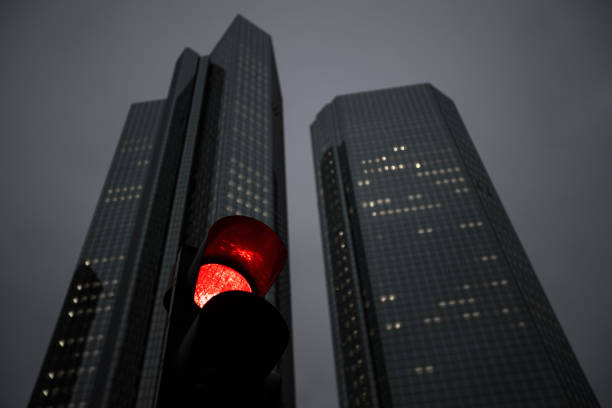 an evening skyline with a red traffic light