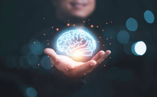 istock Business holding virtual brain icon for education and creative thinking idea to problem solving concept. 1359135737