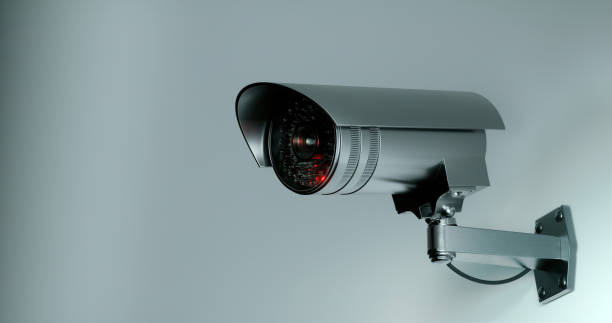 istock Futuristic security cameras scanning the street 1359139555
