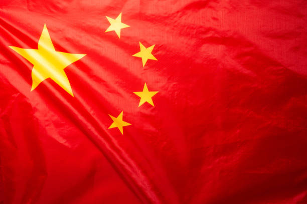 istock China flag waving as a background. 1359141456