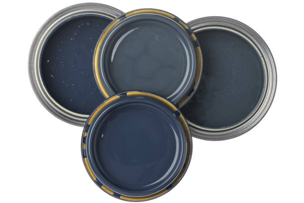 istock Opened cans with blue paint top view isolated on white 1359143006