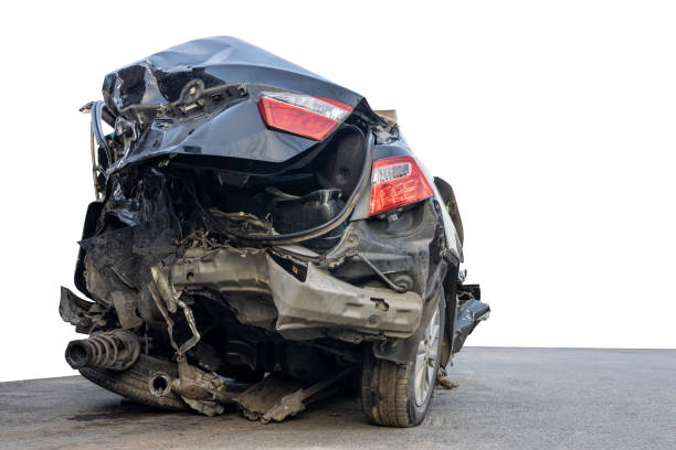 istock The rear isolate of a black car, which was devastated to wreckage. 1359144539