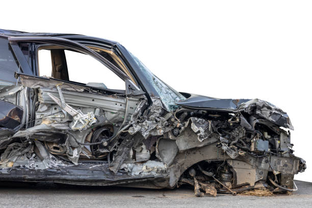 istock A close-up isolate on the side of the front of a black car, smashed into wreckage. 1359144545