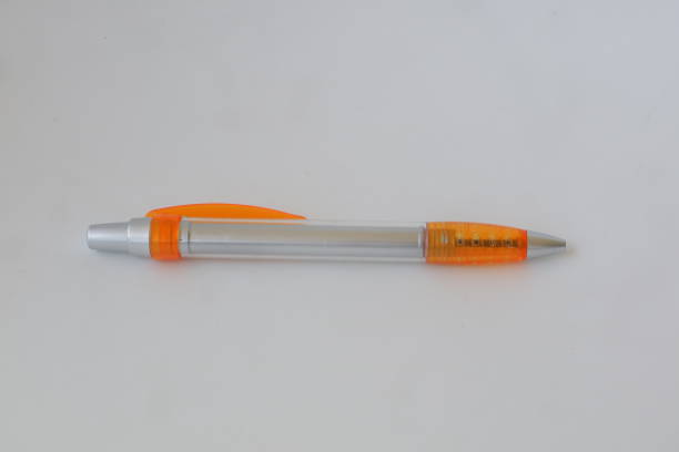 istock orange gray pen on a white background 1359146876