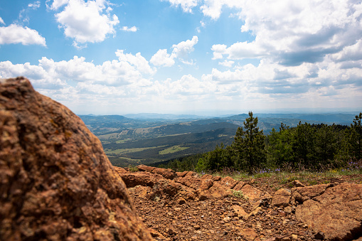 Panoramic view from the mountain peak of the landscape and amazing blue cloudy sky. Divcibare mountain in Serbia