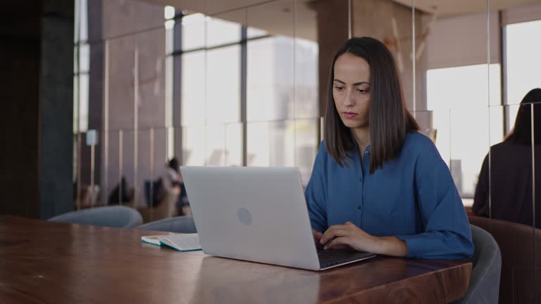 Woman working on laptop