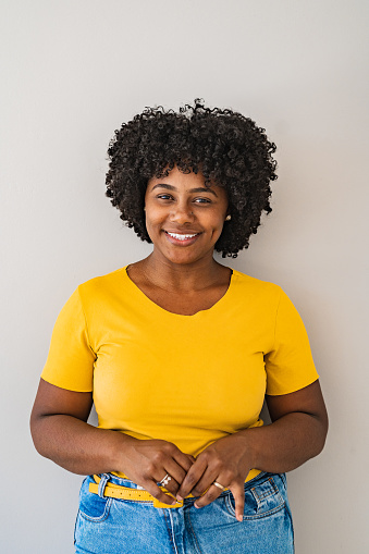 Studio shot of a smiling African American woman
