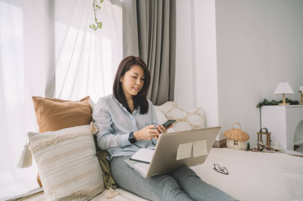 istock Getting her home business up and running 1359154608