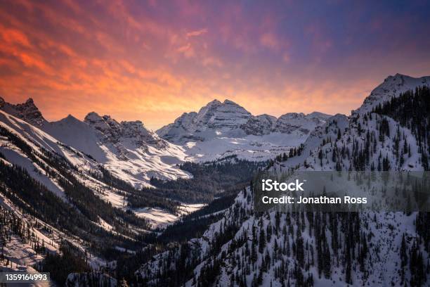 Maroon Bells During A Vibrant Sunset Stock Photo - Download Image Now - Winter, Colorado, Landscape - Scenery