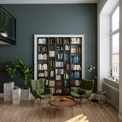 Interior de la sala de lectura con estantería, sillones verdes, mesa de centro y plantas en macetas photo