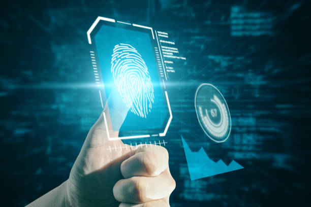istock Close up of hand pointing at creative glowing blue fingerprint scanner interface on dark backdrop. Technology, information and identification concept. Double exposure. 1359167297