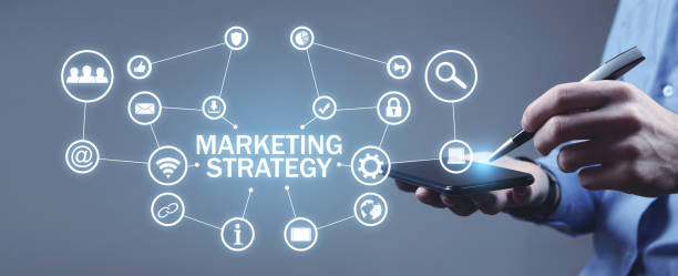 istock Human holding smartphone with a Marketing Strategy concept. 1359167575