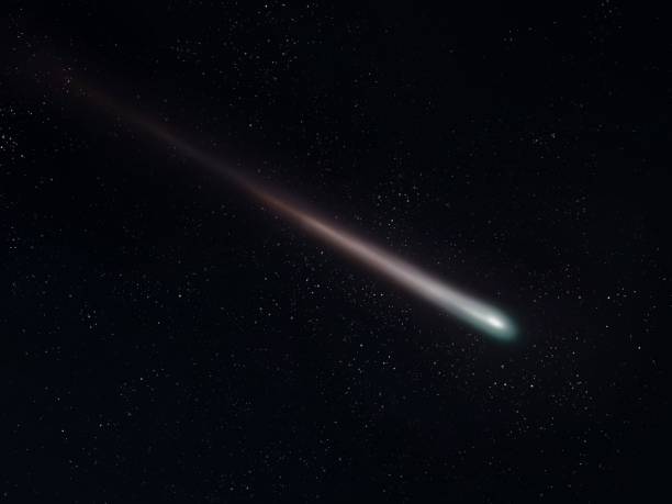 istock Bright meteor in the night sky. Falling star. 1359168934