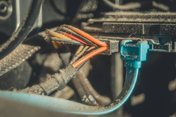 istock Dusty hard drive connection wires on your desktop computer. A layer of dust and dirt on the insulation of the power cables. Selective focus 1359174346