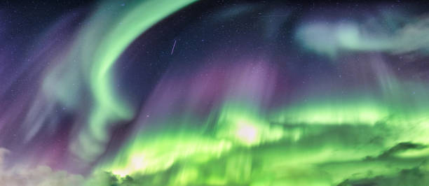 istock Aurora borealis, Northern lights glowing with starry in the night 1359176309