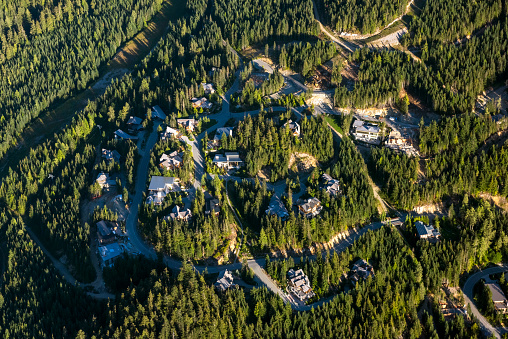 Aerial of a Whistler, Canada neighbourhood. Luxury homes in the mountains.