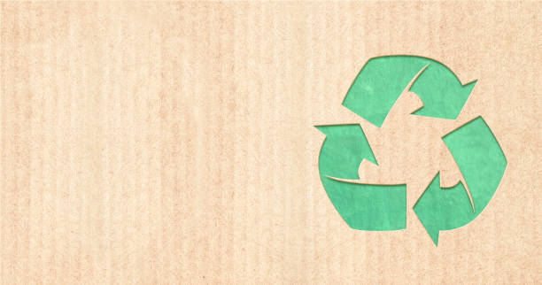 istock Arrows recycle symbol on striped cardboard texture 1359184205