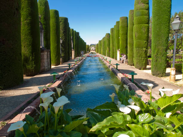 Cordoba, Andalusia, Spain. 05/01/2010.   Gardens, ponds and statues in the Alcazar de los Reyes Cristianos in Cordoba.