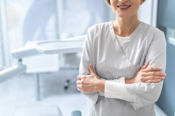 istock Doctor with crossed arms looking at camera 1359186698