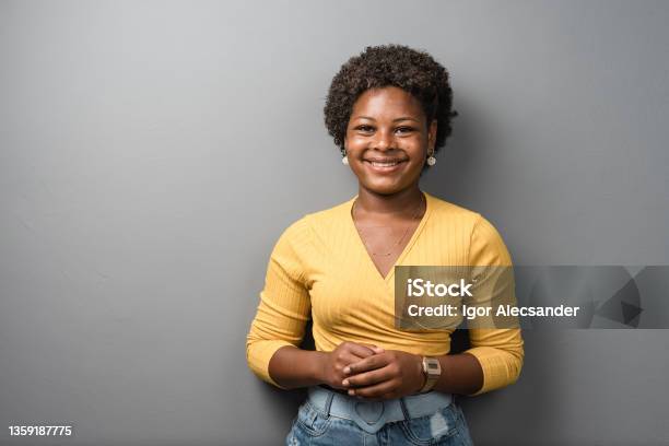 Portrait Of A Smiling Teenage Girl In The Studio Stock Photo - Download Image Now - Brazil, Brazilian Ethnicity, Modern