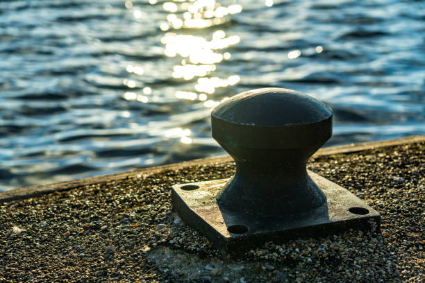 Bollard for mooring the vessel Bollard for mooring the vessel wharfe river photos stock pictures, royalty-free photos & images