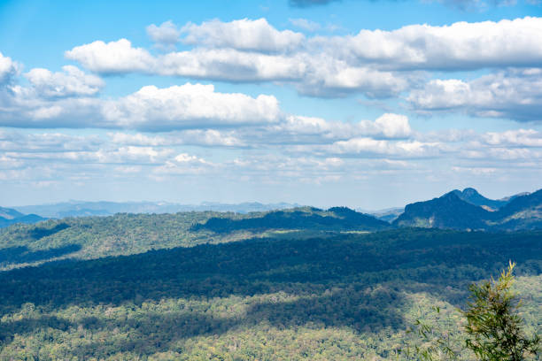 istock Blue sky and white clouds over hills on daytime 1359191386