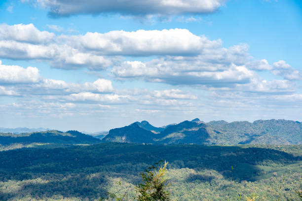 istock Blue sky and white clouds over hills on daytime 1359191388