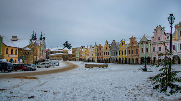 istock Square in old Telc town in winter dark cold morning 1359191480