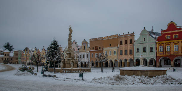istock Square in old Telc town in winter dark cold morning 1359191481