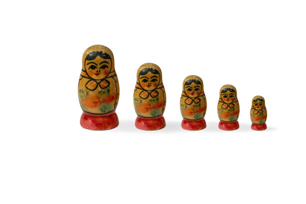 Wooden matruska dolls Wooden matruska dolls isolated on white background babuska stock pictures, royalty-free photos & images