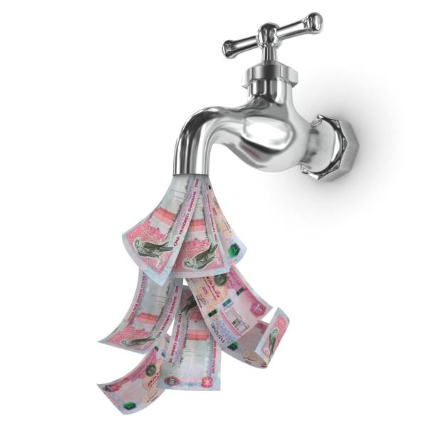 istock UAE dirham falling money finance crisis faucet 1359201532