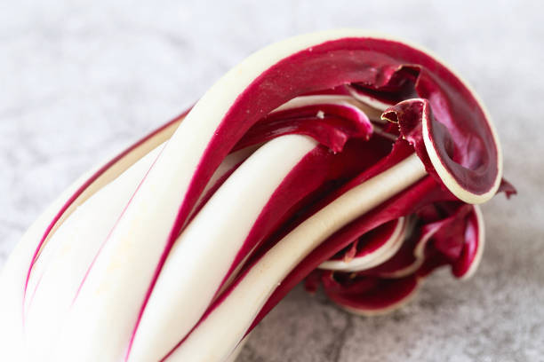 Radicchio Rosso di Treviso. Bright red with a slightly bitter flavour, Radicchio Rosso di Treviso PGI uses natural spring water to bring out its particular colour and taste.