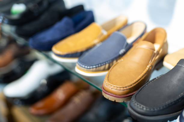 istock Showcase with casual shoes in a  store 1359206216
