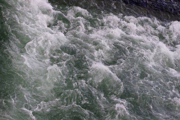 istock Waves. Top view of foaming water surface as abstract nature background 1359214655
