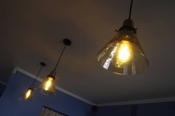istock Decorative antique edison light bulbs with straight wire. 1359217077