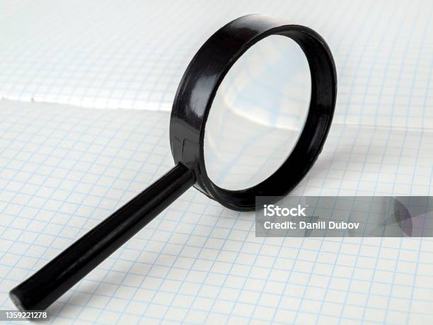 Magnifying Glass An Optical System Consisting Of One Or More Lenses And Designed To Magnify And Observe Small Objects Located At A Finite Distance Selective Stock Photo - Download Image Now