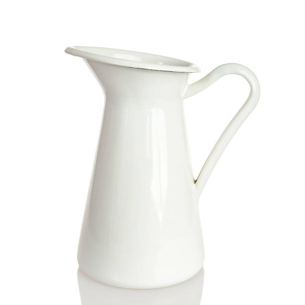istock White painted metal vase, decor, isolated on a white 1359223478