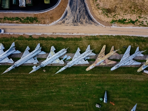 Aerial view of military aircrafts in the airfield.