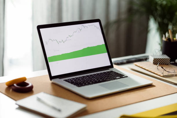 istock Working at Home:  Empty Home Office With a Laptop on the Desk 1359226915