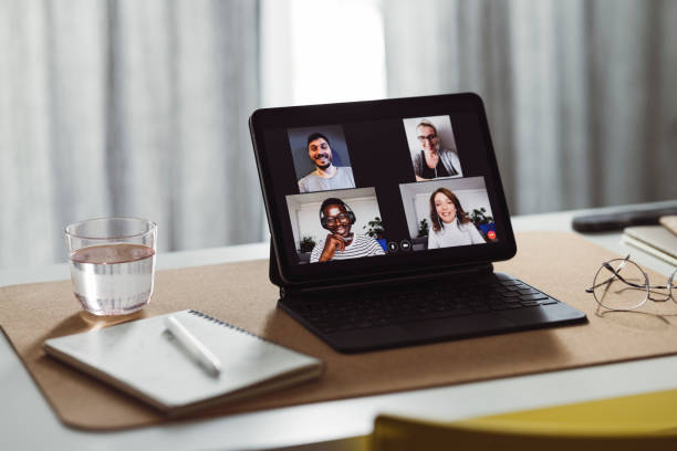 istock Teleconferencing at Home:  Empty Home Office With a Digital Tablet on the Desk 1359226943