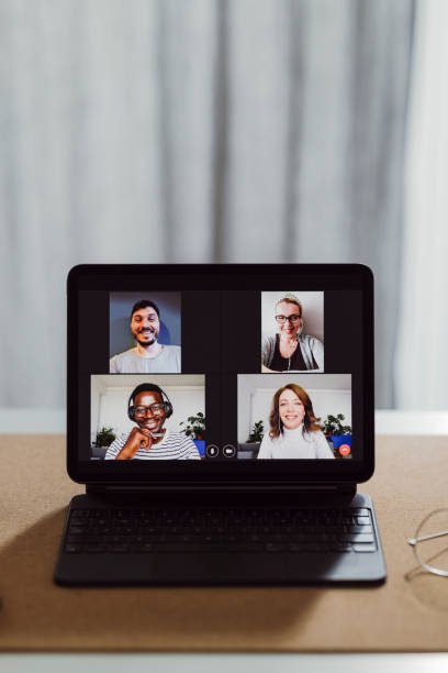 istock Teleconferencing at Home:  Empty Home Office With a Digital Tablet on the Desk 1359226949